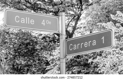 Street Signs In The City Of Cali In Columbia In Black And White
