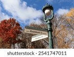 Street signs on the plains Abraham with an old floor lamp.  Names of road in the Battlefield park in Canada. The Garneau street in Abraham park in Quebec city. Travel in Canada and destination. 