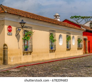 Street Of Spanish Colonial Houses In Antigua, A UNESCO World Heritage City In Guatemala, Central America.