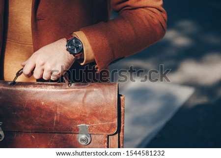 Similar – Image, Stock Photo Elegant woman wearing blue dress, wristwatch holding handbag