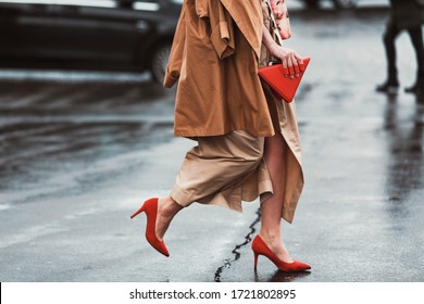 Street style accessories – Red pointed high heel shoes and red leather triangle purse detail  – StreetStyleFW2020