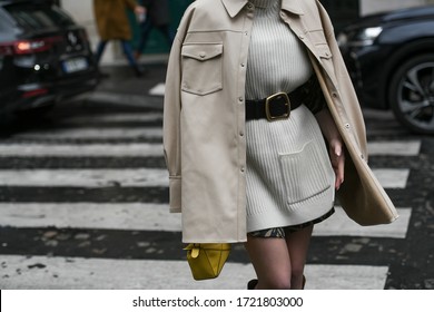 Street Style Outfit – Woman Wearing A Knitted Dress Matched With A Black Belt And A Pastel Leather Jacket – StreetStyleFW2020