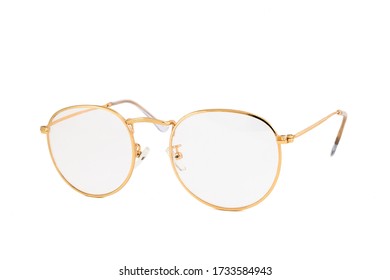 Street style reading glasses with clear lens and gold wrap around oval frames, isolated on white background, side view.