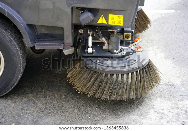 Street
sweeper machine working. Street cleaning
machine.
