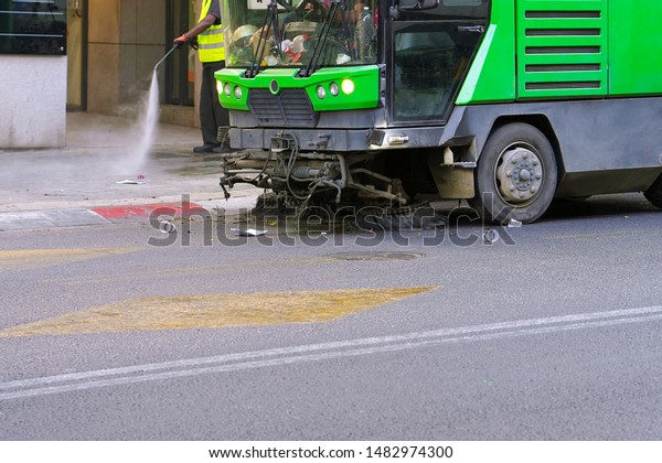 Street sweeper machine working.\
Street cleaning machine.                             \
