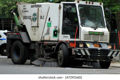 street sweeper, street sweeping vehicle seen in the crown heights section of Brooklyn on a sunny summer day august 7 2019