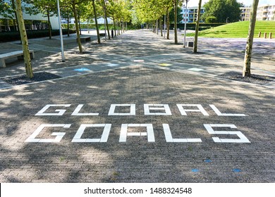 Street With Text Global Goals. World Leaders Goals For A Better World. These Goals Have The Power To End Poverty, Inequality And Stop Climate Change. 