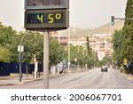 Street thermometer marking 45 degrees celsius in summer, excessive heat