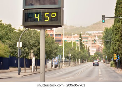 Street thermometer marking 45 degrees celsius in summer, excessive heat