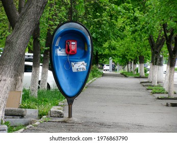 Street Toll Red Payphone On Blue Wall