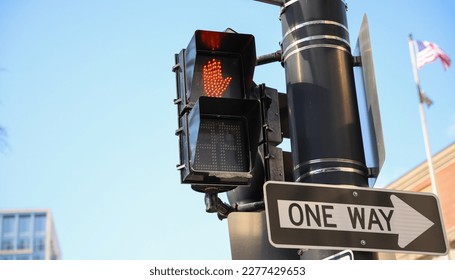 street traffic light during rush hour at crosswalk red and yellow at intersection for pedestrian safety depicting a control  warning and caution in urban street with signaling danger - Powered by Shutterstock