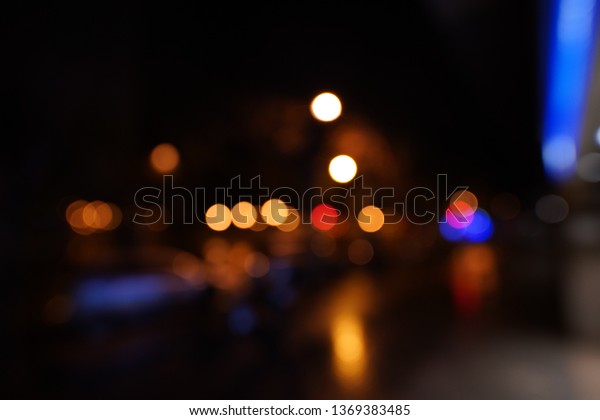 Street Under The\
Rain At Night. Barcelona\
blur