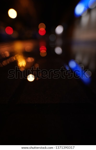 Street Under The Rain\
At Night. Barcelona