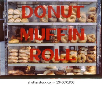 Street Vendor Donut, Muffin And Roll Cart, At Midtown Manhattan, NYC , USA