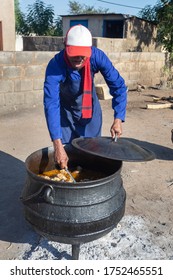 Street Vendor, Man Cooking Traditional Botswana Food Boiled Cow Heels