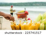 street vendor sells popcorn on the beach