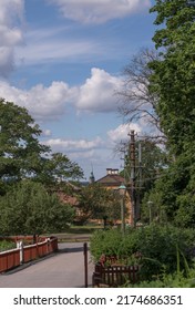 Street View In A Park With Old Houses, Gardens And Land Line Telephone Pole, A Summer Day In Stockholm, Sweden 2022-07-03