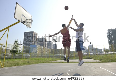 Similar – Image, Stock Photo man playing basketball shadow silhouette in the street