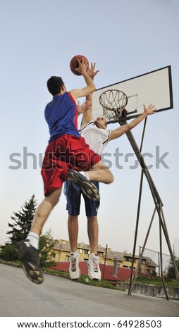 Similar – Image, Stock Photo man playing basketball shadow silhouette in the street