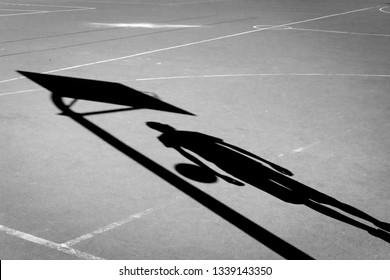  Streetball duel under the hoop, shadow 