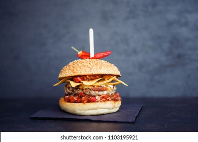 Streetfood Mexican Burger With Red Paper On The Black Background