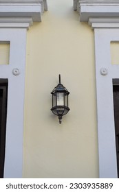 streetlamp lantern on house wall. streetlamp lantern outdoor. photo of streetlamp lantern