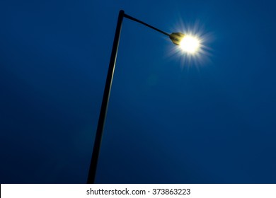 Streetlight, Lamppost And Sky At Dusk.