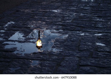 Streetlight in a puddle