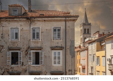 Streets, alleys and buildings of a historic Mediterranean old town on the Mediterranean Sea. A sunny day in the coastal town with a port on the Adriatic Sea, Zadar, Dalmatia, Croatia - Powered by Shutterstock