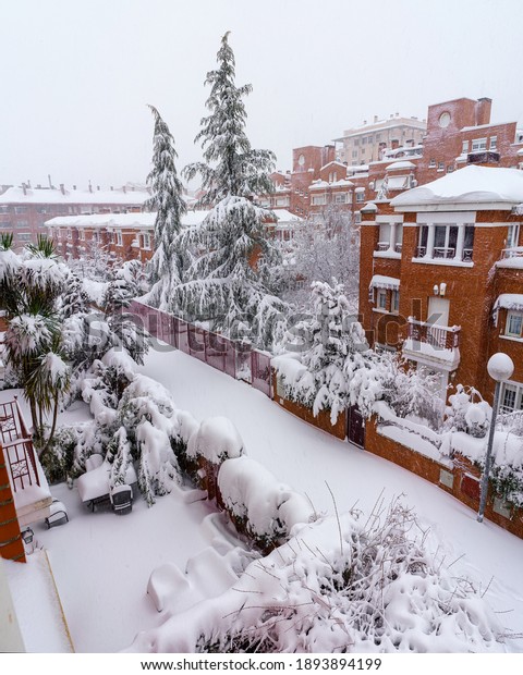 Streets and buildings covered
in snow by day due to snowstorm Filomena falling in Madrid
Spain
