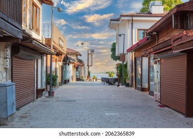 The Streets Of The City Centre, The Bazaar And The Port Area In Side, Antalya. Street View. Sunset Cloudy Sky. Cafe, Restaurant, Shop And Houses. No People. Selective Focus