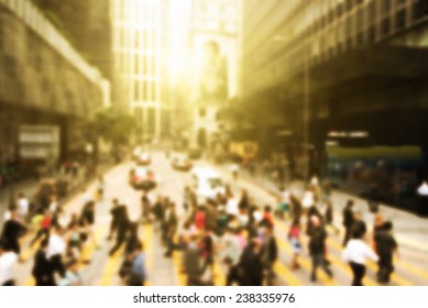 Streets Of Hong Kong City. People Cross The Road At A Pedestrian Crossing.