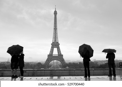 Streets of Paris with Eiffel Tower in rain - Powered by Shutterstock