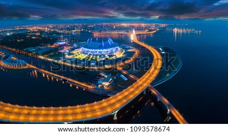 Streets of St. Petersburg from a height. Beautiful aerial view from the bird's eye view of the Gulf of Finland, Saint-Petersburg, Russia, with a stadium.  Krestovsky Island.