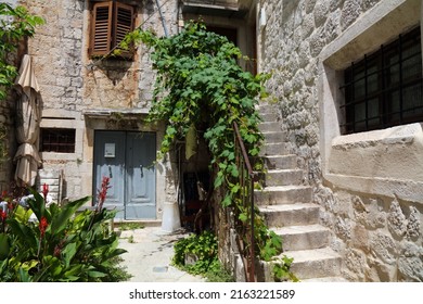 Streets of Trogir old town in Croatia. Quaint backyard in Croatia.