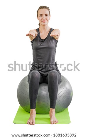Strength posture of healthy young Caucasian women wearing sportswear with sitting strength posture ball Yoga workout isolated on white background with clipping path. Sports people body .