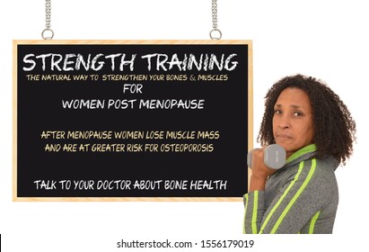 Strength Training For Menopause Women At Risk For Osteoporosis Blackboard Sign Woman Looking At Camera Holding Weight White Background