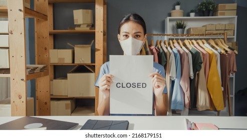 Stress Asian Lady With Casual Show Close Sign In Shop Get Business Trouble On Virus Pandemic No Order From Customer. Owner With Mask Close Store To Quarantine Covid-19, Small Business Bankrupt.