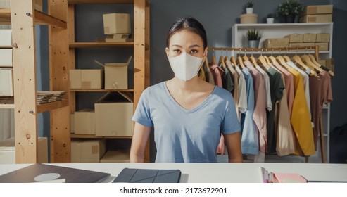 Stress Asian Lady With Casual Show Close Sign In Shop Get Business Trouble On Virus Pandemic No Order From Customer. Owner With Mask Close Store To Quarantine Covid-19, Small Business Bankrupt.