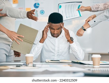 Stress, burnout and tired black man with headache, frustrated or overwhelmed by coworkers at workplace. Overworked, mental health and anxiety of exhausted male worker multitasking at desk in office. - Shutterstock ID 2240312509