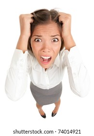 Stress. Business woman frustrated and stressed pulling her hair. Funny image of young Caucasian Asian businesswoman