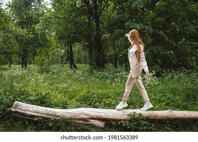 Stress And Resilience. Spend Time In Nature To Reduce Stress And Anxiety. Nature Break Relieves Stress. Young Woman In Suit Enjoying Nature And Walking In Green Summer Park