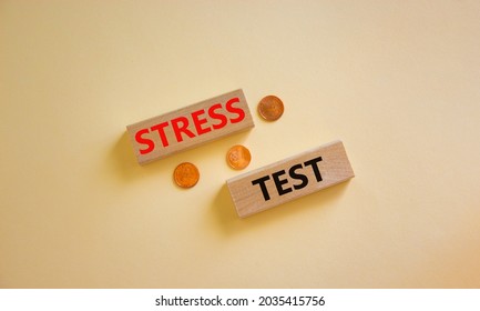 Stress Test Symbol. Concept Words 'stress Test' On Wooden Blocks On A Beautiful White Background, Metallic Coins. Business And Stress Test Concept, Copy Space.