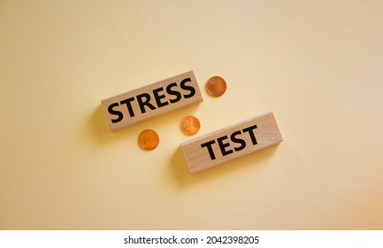 Stress Test Symbol. Concept Words 'stress Test' On Wooden Blocks On A Beautiful White Background, Metallic Coins. Business And Stress Test Concept, Copy Space.