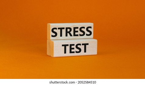 Stress Test Symbol. Concept Words Stress Test On Wooden Blocks On A Beautiful Orange Background. Business And Stress Test Concept, Copy Space.