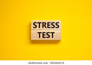 Stress Test Symbol. Concept Words Stress Test On Wooden Blocks On A Beautiful Yellow Background. Business And Stress Test Concept, Copy Space.