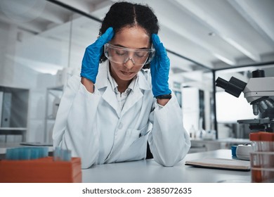 Stress, woman or scientist with headache in a laboratory suffering from burnout, migraine pain or overworked. Exhausted, frustrated or tired worker working on science research with fatigue or tension - Powered by Shutterstock