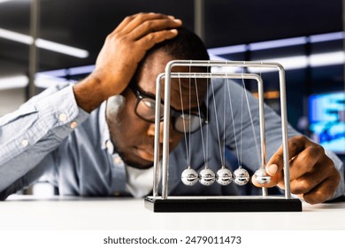 Stressed African American Accountant Overwhelmed at Desk, Frustrated Graphic Designer Working Late, Exhausted Businessman at Office Deadline. - Powered by Shutterstock