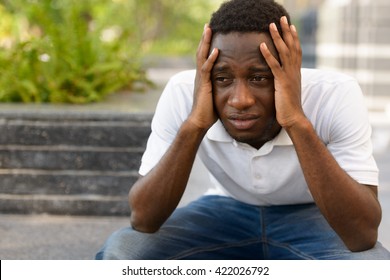 Stressed African Man Outdoors