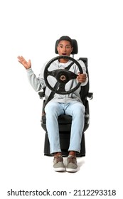 Stressed African-American Man In Car Seat And With Steering Wheel On White Background